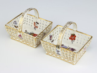 A pair of 19th Century porcelain rectangular baskets with pierced bodies and floral decoration 7cm 
