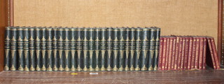 26 volumes "The Works of Sir Walter Scott" half leather bound, published by Adam and Charles Black Edinburgh 1863,  together with 16 volumes "The Temple Shakespeare"  published by J M Dent, leather bound 