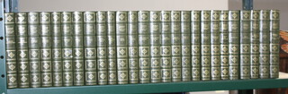 26 volumes, The Centennial Edition "Works of Charles Dickens" with green binding 