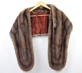A mink stole complete with receipt of sale 