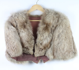 A lady's full length light beaver lamb jacket, a lady's full length fur coat and a fur stole 
