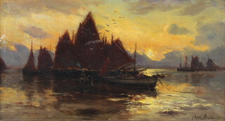 19th Century oil on canvas, indistinctly signed, moonlit harbour scene with moored boats 19cm x 37cm 