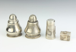 A pair of Peruvian silver baluster peppers, a conical ditto and a trinket chest, 114 grams 