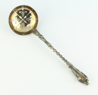 A Victorian silver sifter spoon with apostle handle Sheffield 1884 