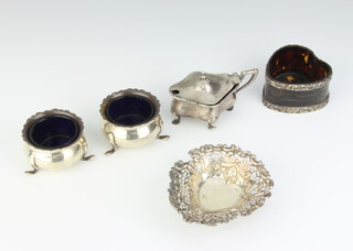 An Edwardian silver mounted tortoiseshell heart shaped box (no lid), London 1900 and minor silver condiments 135 grams weighable silver