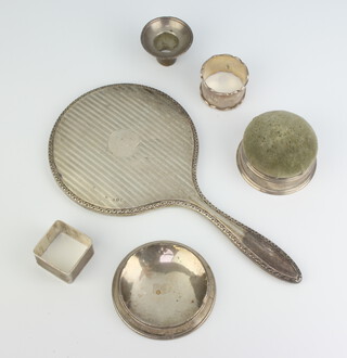 A Tiffany sterling silver circular pin cushion and minor silver ware 