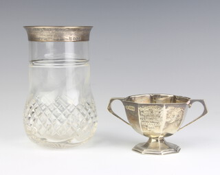 A Victorian silver octagonal 2 handled presentation trophy London 1872, 46 grams and a silver mounted vase 