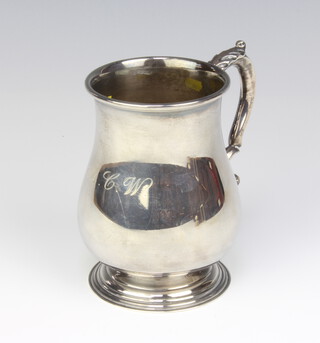 A silver baluster mug with engraved monogram London 1985, maker Asprey and Company, 10cm, 184 grams 