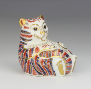 A Royal Crown Derby Imari pattern paperweight of a tiger cub, red stopper 8cm 