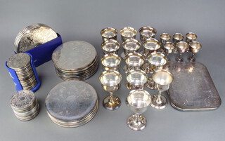A quantity of plated table mats, coasters and goblets 