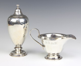 An Edwardian baluster silver shaker London 1910 and a pedestal jug Sheffield 1939, 260 grams 
