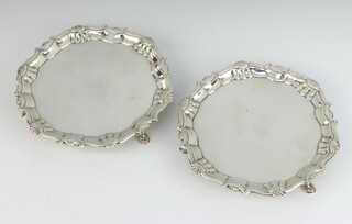 A pair of George II silver card trays, London 1740, 15cm, 388 grams, maker Robert Abercromby 