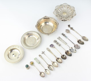 A silver Armada dish London 1976, 1 dish, a tazza, bowl, 11 souvenir spoons and a silver thimble, 270 grams 