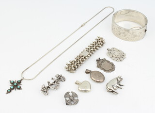 A silver bangle and minor silver jewellery 117 grams