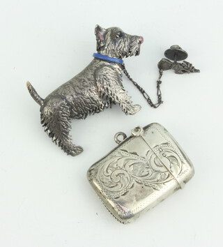 A silver and enamel Highland Terrier brooch and a vesta, 41 grams