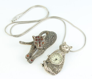 A marcasite cat pendant watch on a silver chain together with a brooch 