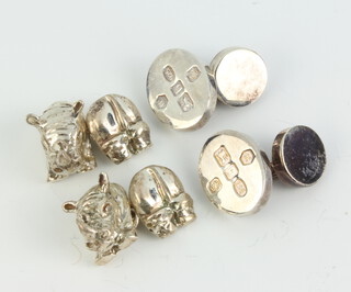 Two pairs of silver cufflinks, 35 grams