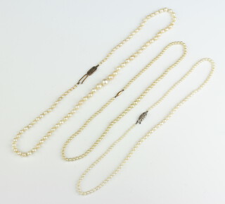 A string of cultured pearls with 9ct yellow gold clasp, 2 others 