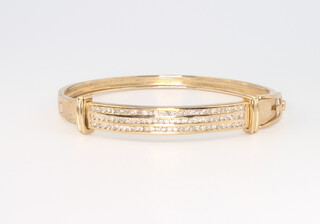 An 18ct yellow gold diamond set bangle, approx 1.5ct 