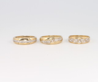 Three 9ct yellow gold diamond set rings size N 
