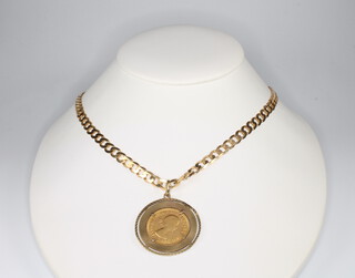 A 1968 sovereign contained in a 9ct mount with chain 54cm total of 9ct gold 28 grams