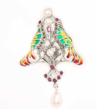 A silver enamelled, pearl and ruby Art Nouveau style brooch 