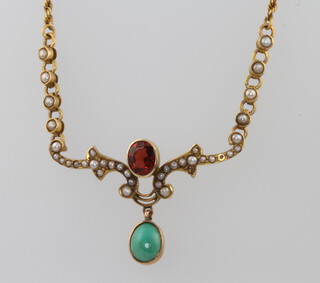 An Edwardian 9ct yellow gold garnet, seed pearl and turquoise necklace on a 9ct chain 40cm