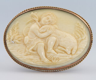 A Victorian carved ivory brooch 55mm x 40mm 