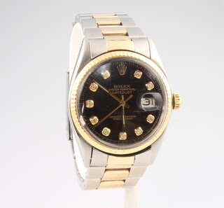Rolex, a gentleman's Rolex Oyster perpetual datejust steel cased wristwatch with diamond dot 5 minute markers on a bimetallic strap numbered 116520 (not marked Rolex) 