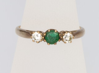 A 9ct yellow gold emerald and diamond 3 stone ring, size O, 2.1 grams