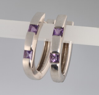 A pair of 9ct white gold amethyst earrings, 4.9 grams 