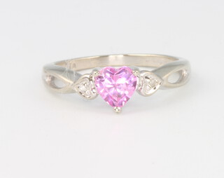 A 9ct yellow gold pink sapphire and diamond ring size H