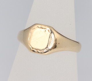 A 9ct yellow gold signet ring size L 1/2 