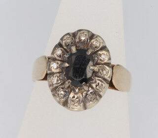 A 9ct yellow gold sapphire and diamond oval cluster ring, size P, 4.6 grams