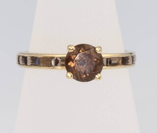 A 9ct yellow gold smoky quartz ring, size N, 1.5 grams