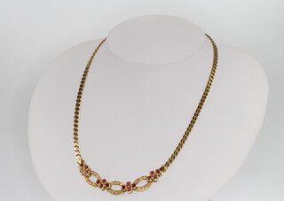 An 18ct yellow gold ruby and diamond necklace 26.5 grams 36cm