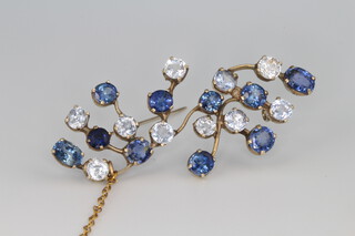 A yellow gold sapphire and gem set spray brooch 55mm, contained in original box  