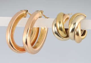 Two pairs of 9ct yellow gold hoop earrings 7.7 grams