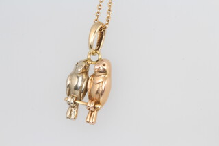 A 14ct 2 colour yellow gold bird pendant and chain 4.1 grams 