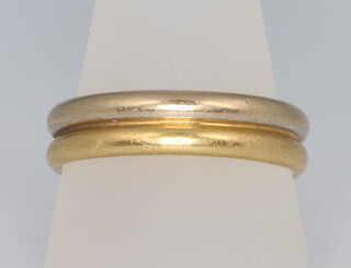 A gentleman's 18ct 2 colour gold diamond set wedding band, size Y, 9.3 grams 