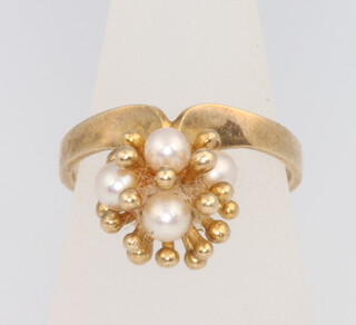 A 9ct yellow gold pearl set ring size L, 3 grams