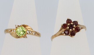 Two 9ct yellow gold gem set rings size N 1/2 and O, 2.5 grams