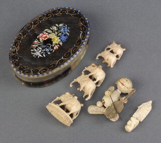 A painted horn trinket box and minor carved figures