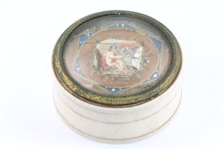 A 19th Century turned ivory trinket box, the lid painted with a cherub 5cm 