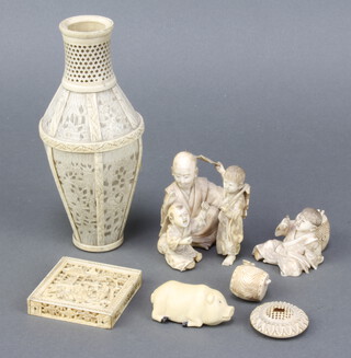 A 19th Century carved Cantonese ivory puzzle contained in a square box decorated with figures in a garden landscape 5.5cm, an Okimono of 3 figures (damaged) and minor carved items 