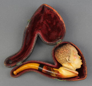 A Victorian carved Meerschaum pipe in the form of a gentleman cased 