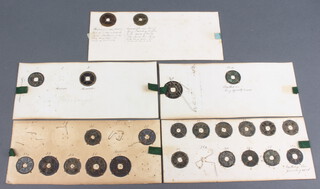 A quantity of Chinese bronze coins including Sung Dynasty attached to 5 cards 