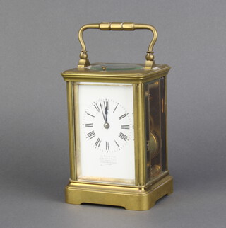 Le Roy and Fils, a 19th Century striking carriage clock, the enamelled dial with Roman numerals marked Le Roy and Fils 13-15 Palais Royal, Paris and 57 Bond Street London, striking on a gong and contained in a gilt case (no key) 