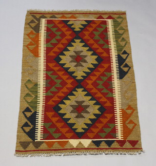 A black, brown and tan ground Maimana Kilim rug 124cm x 180cm 