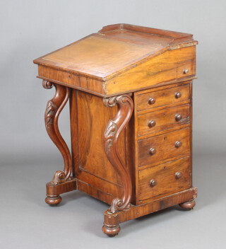 A Victorian rosewood Davenport desk with 3/4 gallery, the pedestal fitted an inkwell drawer above 4 drawers raised on cabriole supports 83cm h x 55cm w x 53cm d 